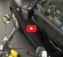 Video: Nevjerovatno! Ljutiti Ruski motorist naoružan brusilicom ganjao vozača Nissana!